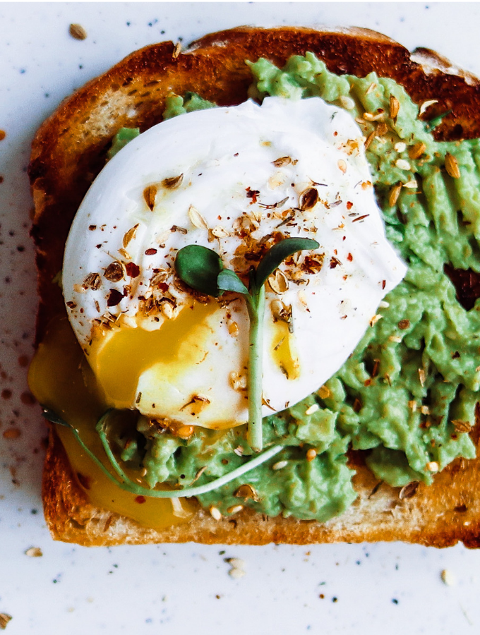 avocado toast with runny egg and dukkah spices